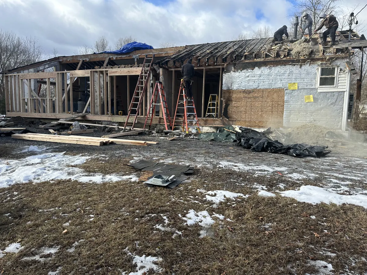 Framing for a home addition going up in winter