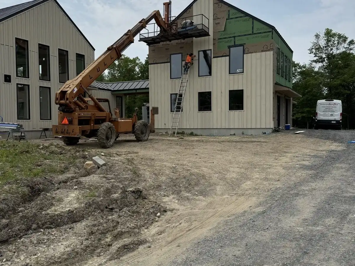Lift placing materials on a new construction project in Gardiner, NY