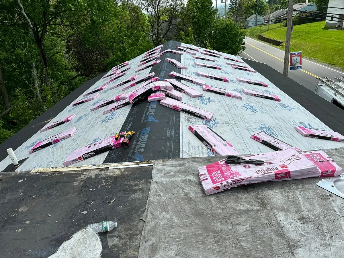 New asphalt shingle roof being installed on a Newburgh home